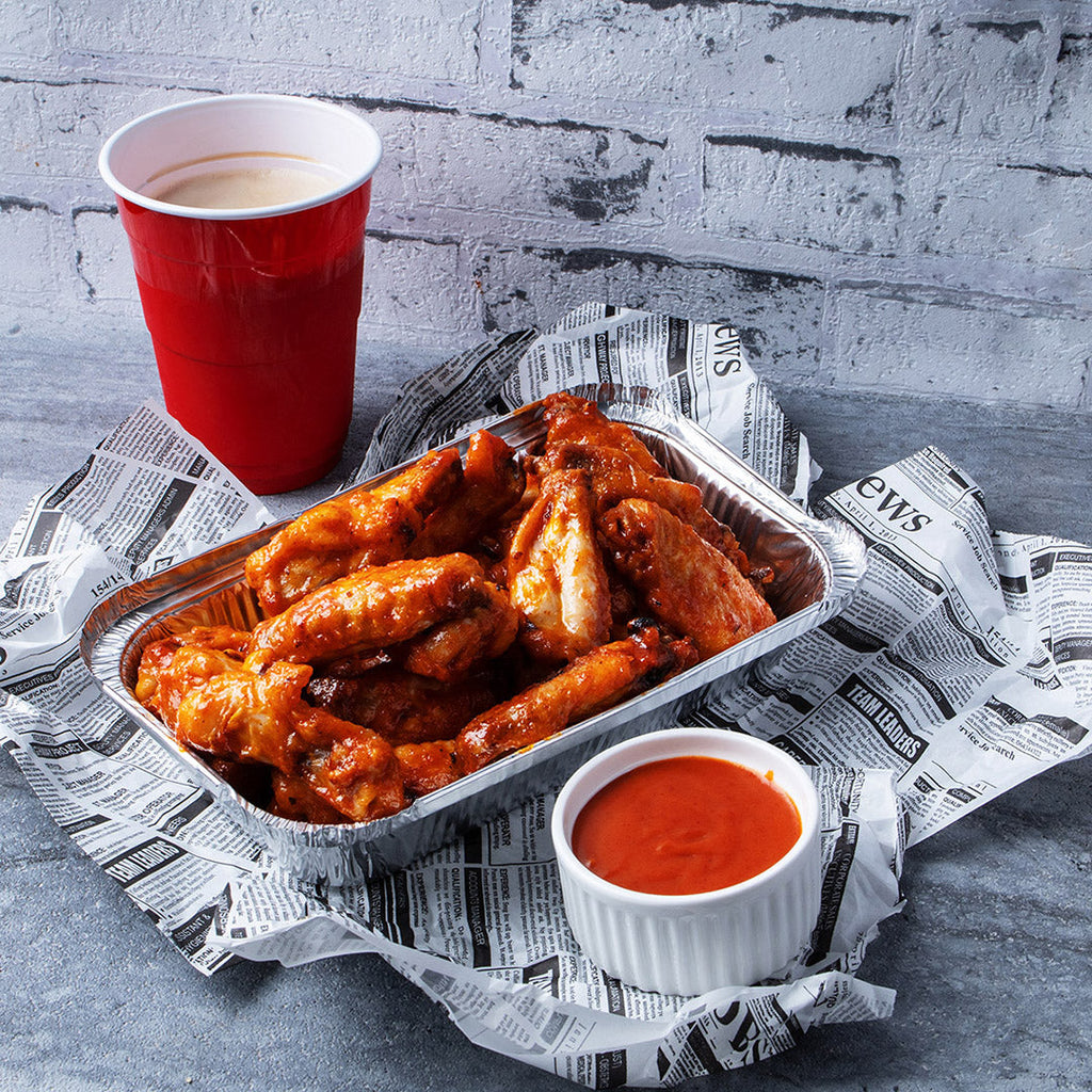 Buffalo Chicken Wings – Würziges Rezept für scharfe Hähnchenflügel Buffalo Chicken Wings – Würziges Rezept für scharfe Hähnchenflügel